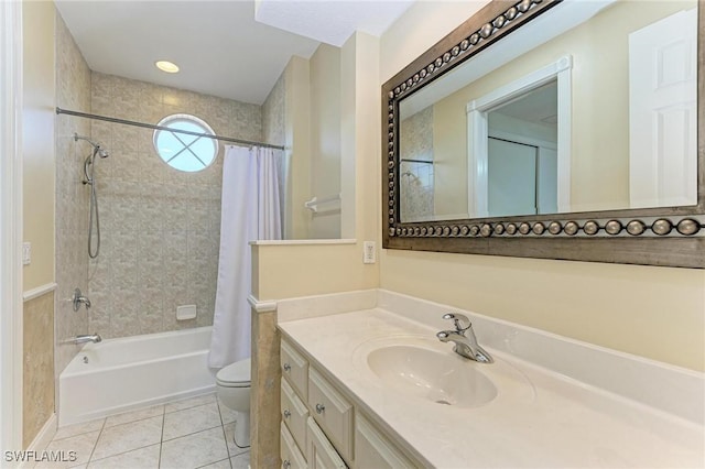 full bathroom featuring tile patterned flooring, vanity, toilet, and shower / tub combo with curtain