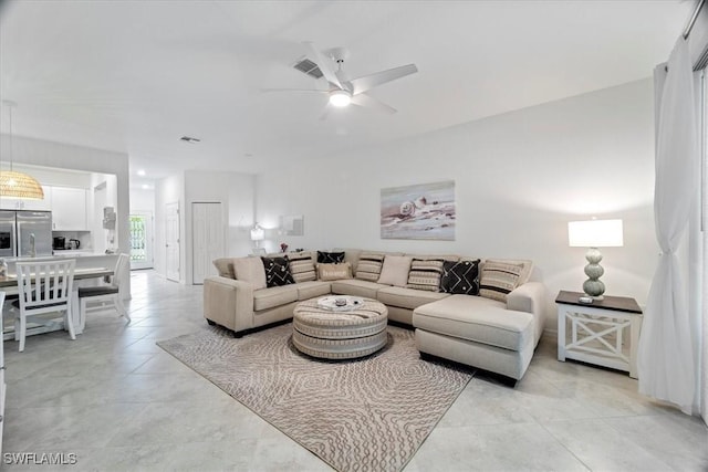 living room with ceiling fan