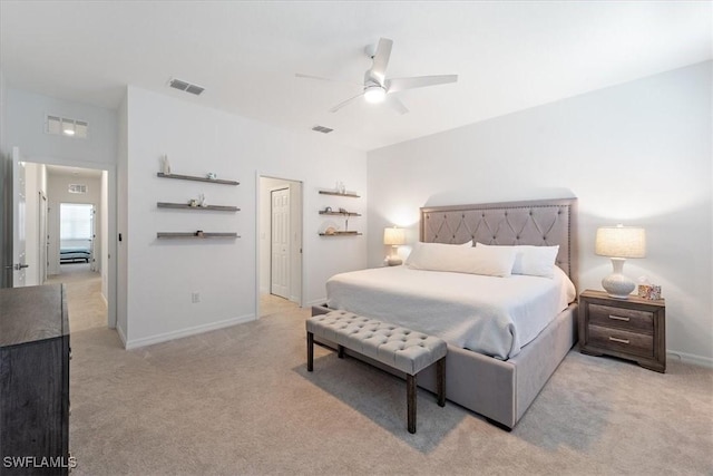 bedroom featuring ceiling fan and light carpet