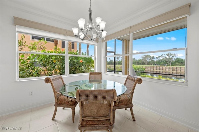 18530 Sandalwood Pointe Unit 101, Fort Myers, FL 33908 - sunroom / solarium with a chandelier and a water view