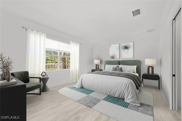 18530 Sandalwood Pointe Unit 101, Fort Myers, FL 33908 - bedroom featuring light wood-style flooring and baseboards