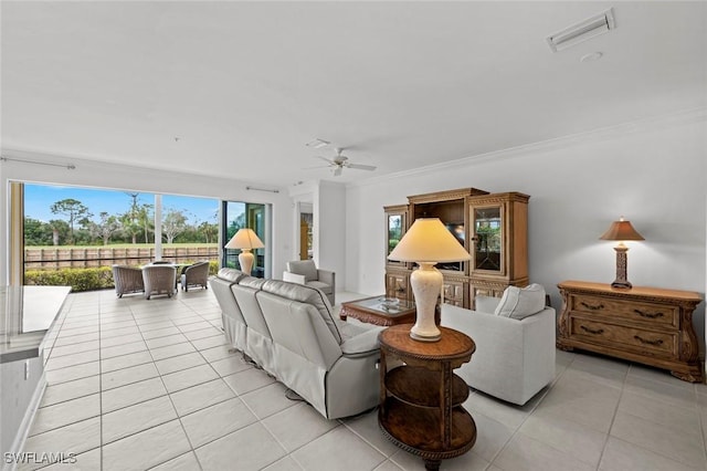 18530 Sandalwood Pointe Unit 101, Fort Myers, FL 33908 - living room featuring light tile patterned floors, ceiling fan, and crown molding