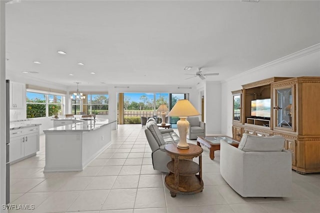 18530 Sandalwood Pointe Unit 101, Fort Myers, FL 33908 - living area with light tile patterned floors, a chandelier, a ceiling fan, crown molding, and recessed lighting