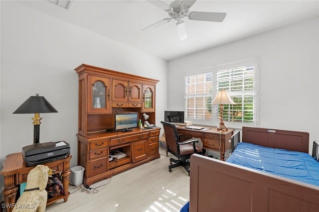 interior space with ceiling fan and light hardwood / wood-style floors