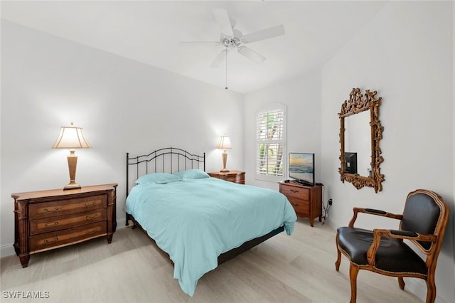 bedroom featuring ceiling fan and light hardwood / wood-style flooring