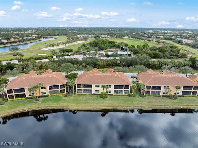 birds eye view of property featuring a water view and golf course view