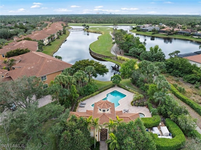 birds eye view of property with a water view