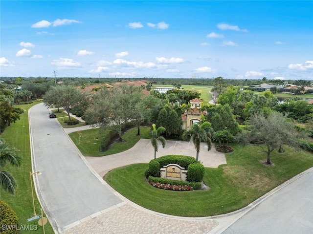 view of community featuring decorative driveway