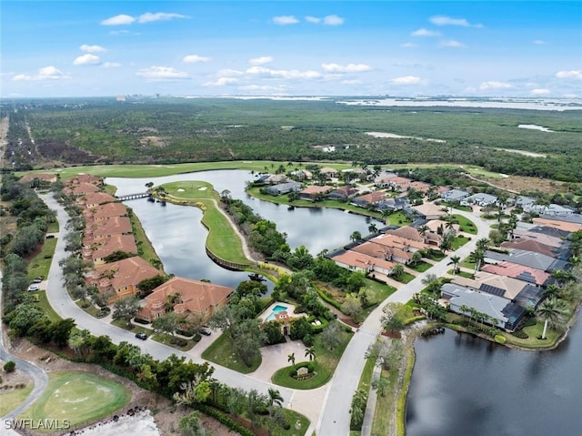 aerial view featuring a residential view, a water view, and golf course view