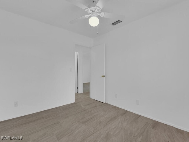 empty room with ceiling fan