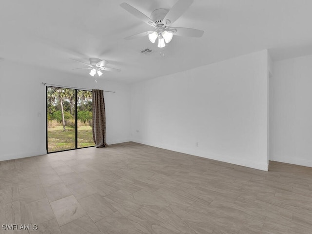 unfurnished room with ceiling fan