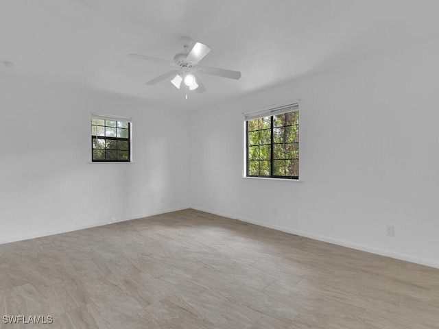 empty room featuring ceiling fan