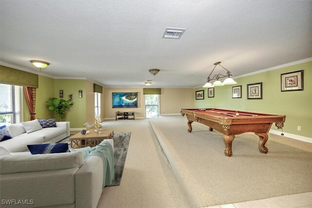 game room with billiards, light carpet, a textured ceiling, and ornamental molding