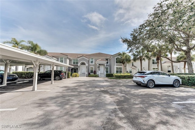 view of car parking featuring a carport