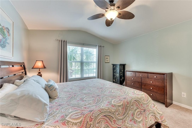 bedroom featuring ceiling fan, light carpet, and lofted ceiling