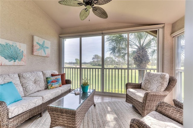 sunroom / solarium featuring vaulted ceiling and ceiling fan