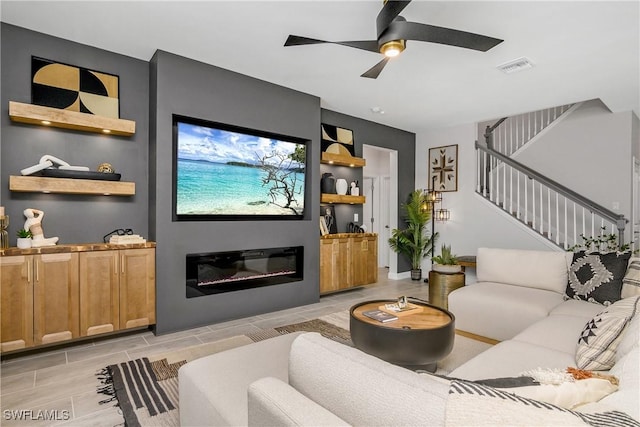 living room with ceiling fan