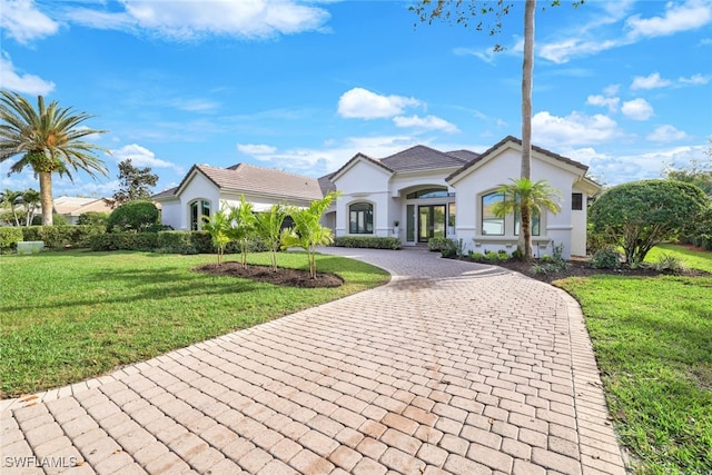 view of front of home with a front lawn