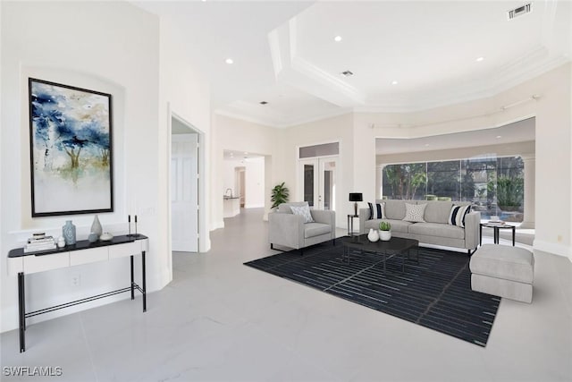 living room with a raised ceiling