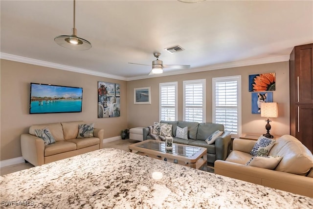 living room featuring a ceiling fan, visible vents, crown molding, and baseboards