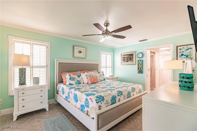 bedroom featuring ornamental molding, visible vents, ceiling fan, and baseboards