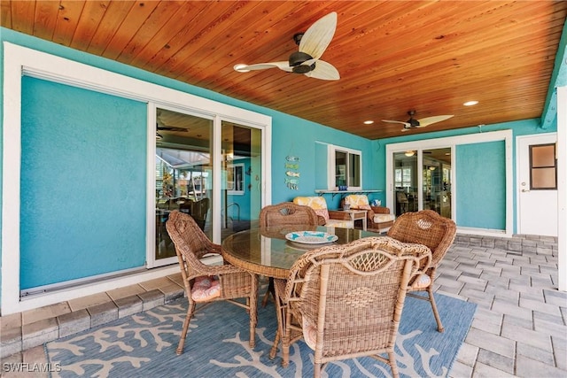 view of patio featuring ceiling fan