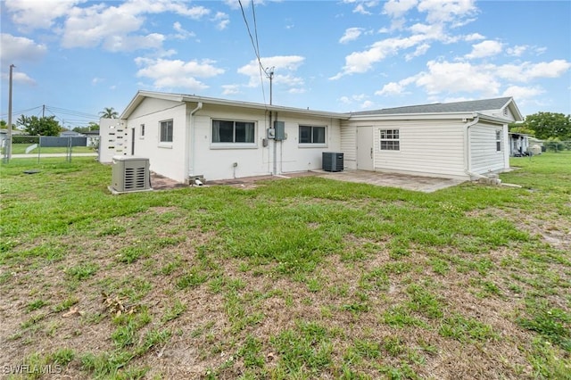 804 Bougainvillea Rd E, Lehigh Acres, FL 33936 - back of house featuring a patio and cooling unit
