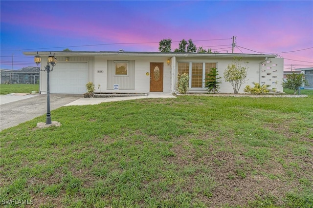 804 Bougainvillea Rd E, Lehigh Acres, FL 33936 - ranch-style home with concrete driveway and an attached garage