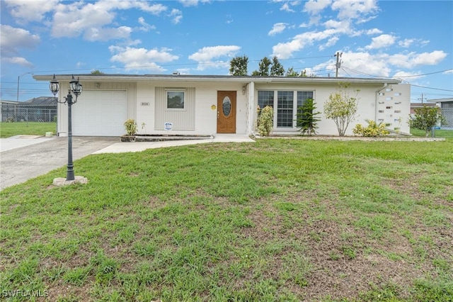 804 Bougainvillea Rd E, Lehigh Acres, FL 33936 - ranch-style home featuring concrete driveway and an attached garage
