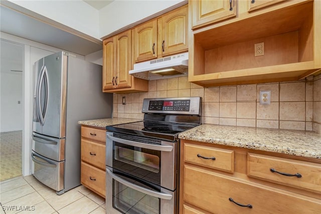 804 Bougainvillea Rd E, Lehigh Acres, FL 33936 - kitchen featuring stainless steel appliances, under cabinet range hood, backsplash, light stone countertops, and light tile patterned flooring