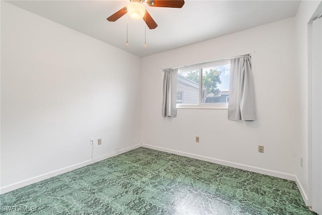 804 Bougainvillea Rd E, Lehigh Acres, FL 33936 - carpeted empty room featuring baseboards and a ceiling fan