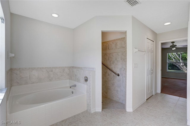 bathroom featuring tile patterned floors and plus walk in shower