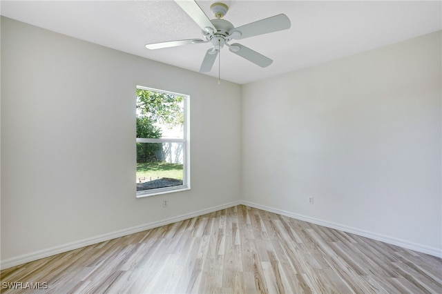 spare room with ceiling fan and light hardwood / wood-style floors