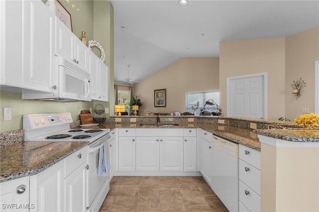 kitchen with white cabinets, white appliances, kitchen peninsula, and sink