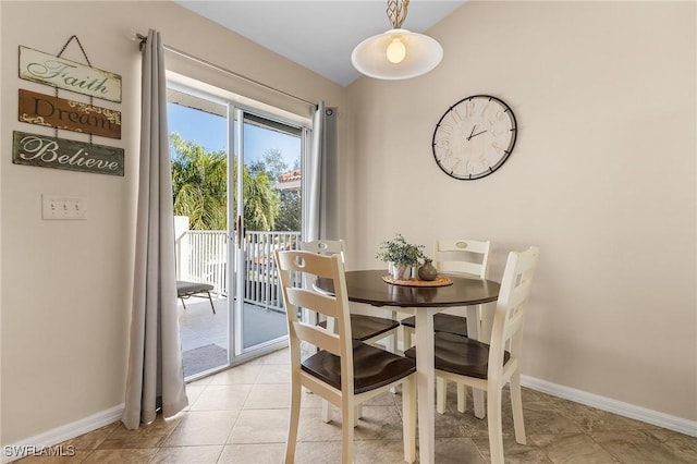 view of tiled dining space