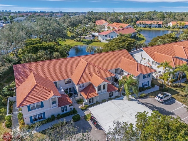 bird's eye view with a water view