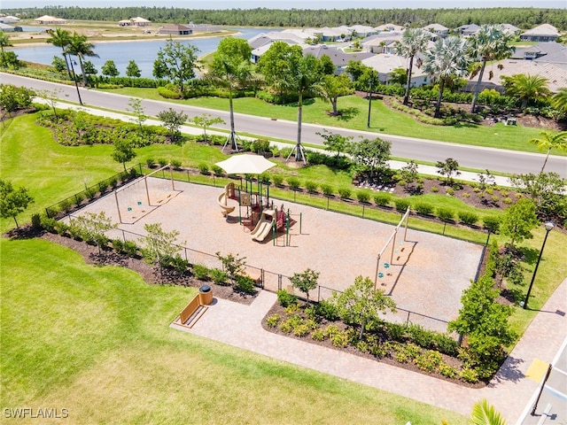 birds eye view of property featuring a water view