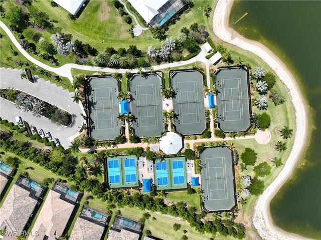 birds eye view of property featuring a water view