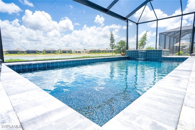 view of pool featuring a lanai and pool water feature