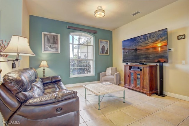 living room featuring light tile patterned floors