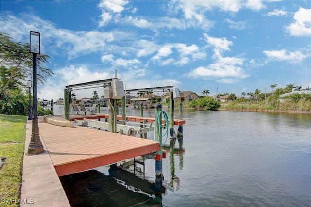 view of dock with a water view