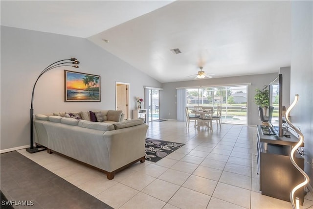 tiled living room featuring vaulted ceiling and ceiling fan