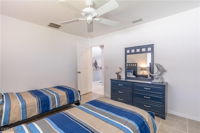 bedroom featuring light tile patterned floors and ceiling fan