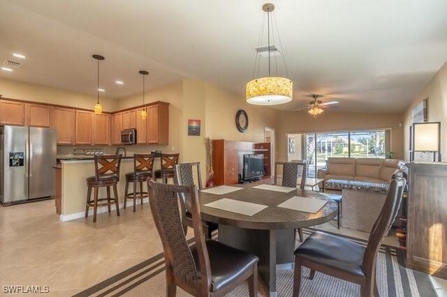 dining area featuring ceiling fan