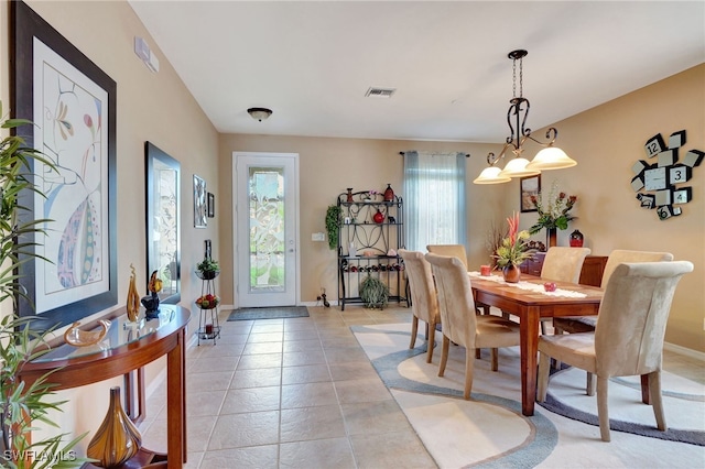 8040 Liriope Loop, Lehigh Acres, FL 33972 - dining room featuring baseboards and light tile patterned floors