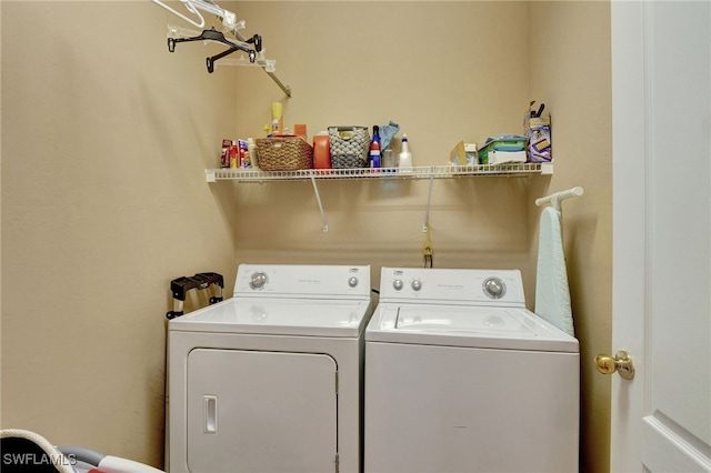 8040 Liriope Loop, Lehigh Acres, FL 33972 - laundry area with washing machine and clothes dryer