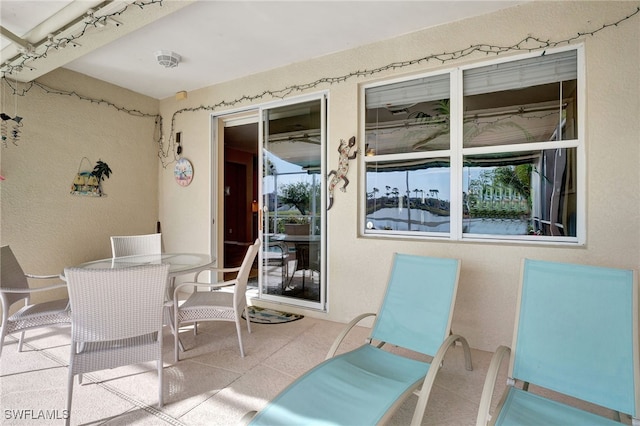 8040 Liriope Loop, Lehigh Acres, FL 33972 - view of patio featuring outdoor dining area