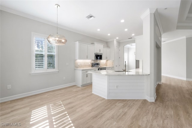 kitchen with sink, stainless steel appliances, light hardwood / wood-style flooring, white cabinets, and ornamental molding