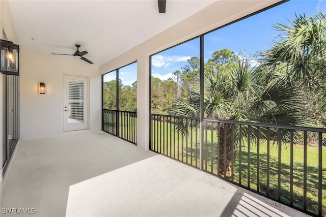 sunroom / solarium with ceiling fan