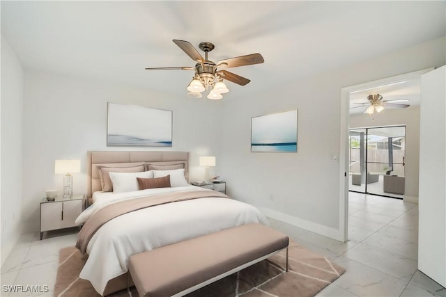 bedroom featuring ceiling fan, marble finish floor, and baseboards